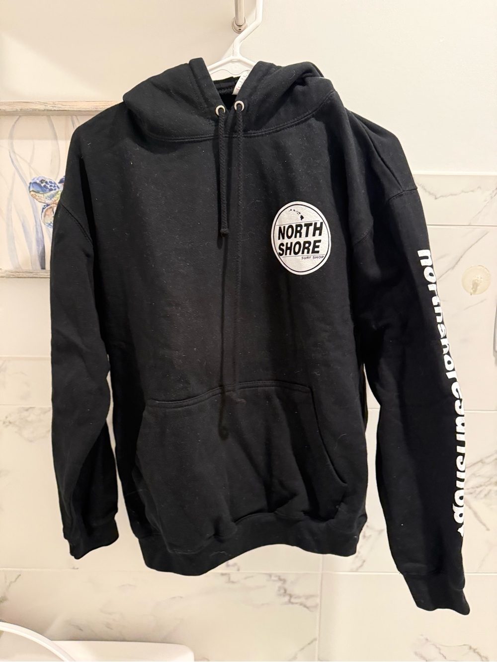 Black Pullover Hoodie with Chest Badge